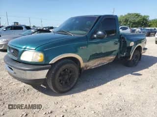 1997 Ford F-150 XL with VIN 1FTDF07W6VKA71774, listed as a Copart auction lot 66630614 with 132,684 mi miles and Salvage title. Bid and sale history available at DreamBid. Image 1.