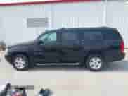 2011 Chevrolet Suburban LT z VIN 1GNSKJE36BR102923, wystawiony jako IAAI lot #42389021 z przebiegiem 213 931 mil mil oraz . Historia ofert i sprzedaży dostępna na DreamBid. Obrazek 14.