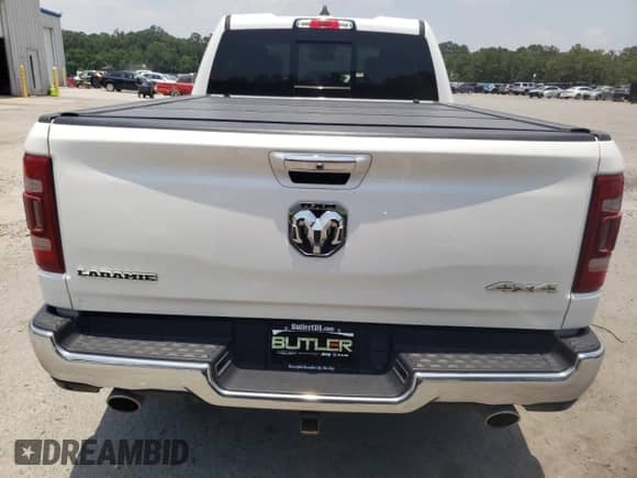 2019 Ram 1500 Laramie z VIN 1C6SRFDT0KN843232, wystawiony jako Copart lot #61789955 z przebiegiem 98 301 mil mil oraz Szkoda całkowita • Salvage title. Historia ofert i sprzedaży dostępna na DreamBid. Obrazek 6.