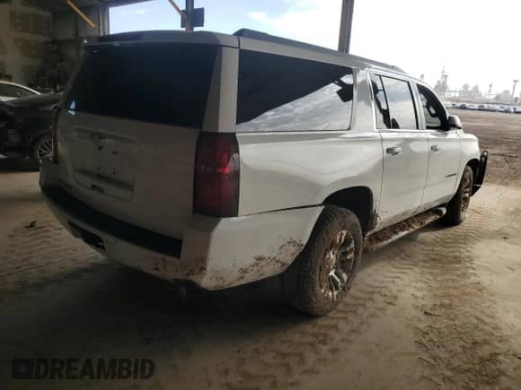 2016 Chevrolet Suburban LT z VIN 1GNSCHKCXGR417368, wystawiony jako Copart lot #81095765 z przebiegiem Nie podano mil oraz Szkoda całkowita • Salvage title. Historia ofert i sprzedaży dostępna na DreamBid. Obrazek 4.