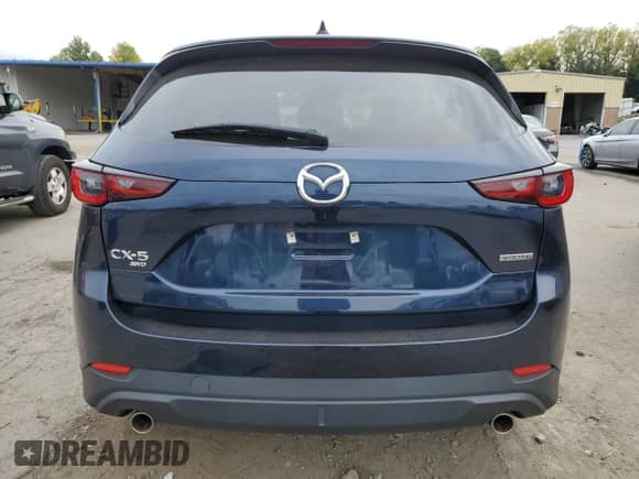 2022 Mazda CX-5 S Preferred z VIN JM3KFBCM1N0630223, wystawiony jako Copart lot #81140105 z przebiegiem 34 217 mil mil oraz Szkoda całkowita • Salvage title. Historia ofert i sprzedaży dostępna na DreamBid. Obrazek 6.