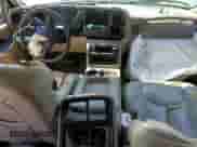 2004 Chevrolet Suburban Z71 z VIN 3GNFK16Z74G305505, wystawiony jako Copart lot #68907834 z przebiegiem Nie podano mil oraz Szkoda całkowita • Salvage title. Historia ofert i sprzedaży dostępna na DreamBid. Obrazek 8.