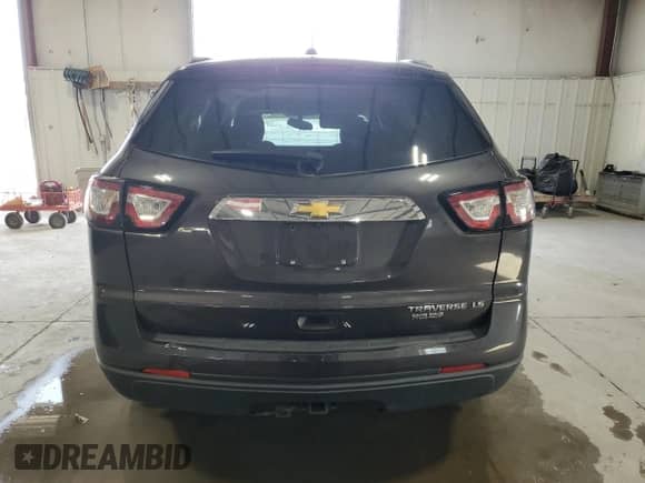 2016 Chevrolet Traverse LS с VIN 1GNKRFED0GJ271617, выставлен на аукционе Copart как лот 85122385 с пробегом 102 790 миль миль и Списание • Salvage title. История ставок и продаж доступна на DreamBid. Изображение 6.