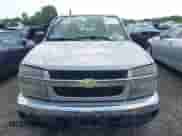 2006 Chevrolet Colorado Work Truck z VIN 1GCDT198168312975, wystawiony jako IAAI lot #42535313 z przebiegiem 70 100 mil mil oraz . Historia ofert i sprzedaży dostępna na DreamBid. Obrazek 6.