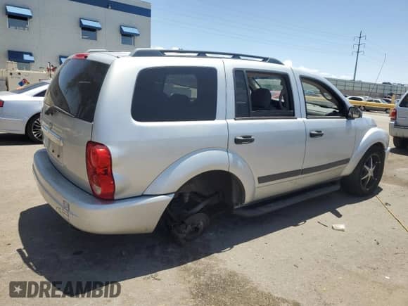 2006 Dodge Durango SLT с VIN 1D4HD48N16F104696, выставлен на аукционе Copart как лот 58417185 с пробегом 165 092 миль миль и Списание • Salvage title. История ставок и продаж доступна на DreamBid. Изображение 3.
