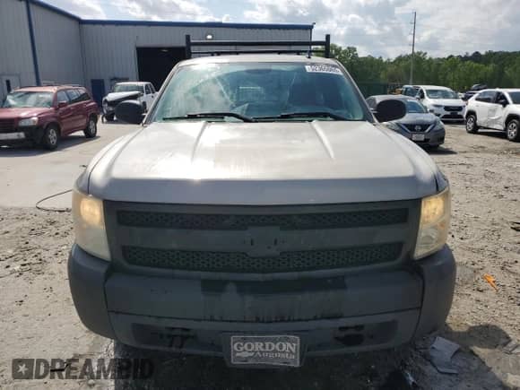 2009 Chevrolet Silverado 1500 Work Truck with VIN 1GCEC14C09Z207472, listed as a Copart auction lot 52365065 with 179,189 mi miles and Salvage title. Bid and sale history available at DreamBid. Image 5.