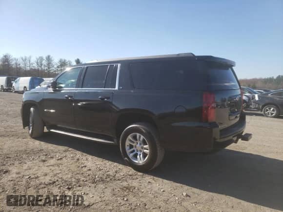 2015 Chevrolet Suburban LT z VIN 1GNSKJKC0FR201554, wystawiony jako Copart lot #45614633 z przebiegiem 81 400 mil mil oraz . Historia ofert i sprzedaży dostępna na DreamBid. Obrazek 2.