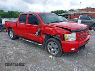 2010 Chevrolet Silverado 1500 LTZ with VIN 3GCRKTE33AG133399, listed as a IAAI auction lot 42524457 with 165,963 mi miles and . Bid and sale history available at DreamBid. Image 1.