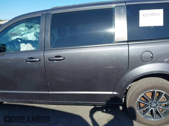 2018 Dodge Grand Caravan SE Plus with VIN 2C4RDGBG2JR191216, listed as a IAAI auction lot 42135531 with 118,354 mi miles and . Bid and sale history available at DreamBid. Image 14.