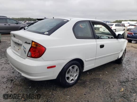 2004 Hyundai Accent GL с VIN KMHCG35C84U285750, выставлен на аукционе Copart как лот 85443094 с пробегом 167 169 миль миль и Списание • Salvage title. История ставок и продаж доступна на DreamBid. Изображение 3.