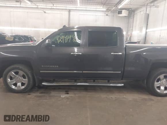 2014 Chevrolet Silverado 1500 LTZ z VIN 3GCUKSEJ5EG296189, wystawiony jako IAAI lot #42941946 z przebiegiem 196 524 mil mil oraz . Historia ofert i sprzedaży dostępna na DreamBid. Obrazek 15.
