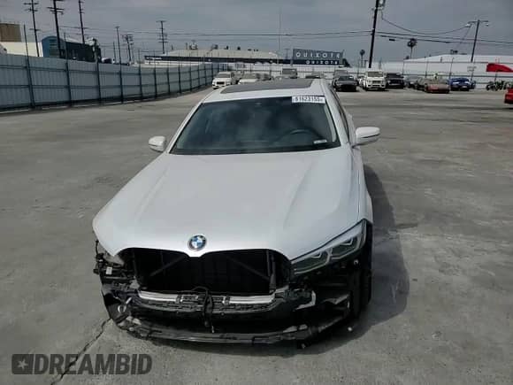 2022 BMW 7 Series 740i z VIN WBA7T2C08NCJ55251, wystawiony jako Copart lot #61623155 z przebiegiem 32 184 mil mil oraz Szkoda całkowita • Salvage title. Historia ofert i sprzedaży dostępna na DreamBid. Obrazek 13.