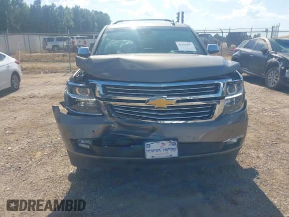 2017 Chevrolet Suburban Premier with VIN 1GNSCJKC5HR309457, listed as a IAAI auction lot 42666197 with 99,932 mi miles and . Bid and sale history available at DreamBid. Image 6.