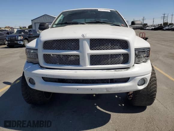 2004 Dodge 2500 SLT с VIN 3D7KU28C94G214581, выставлен на аукционе Copart как лот 70146655 с пробегом 403 281 миль миль и Списание • Salvage title. История ставок и продаж доступна на DreamBid. Изображение 5.