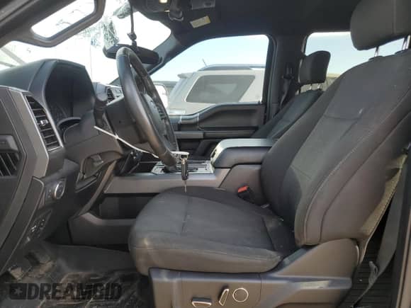 2018 Ford F-150 XL z VIN 1FTEW1EPXJFD68765, wystawiony jako Copart lot #69776875 z przebiegiem 125 040 mil mil oraz Szkoda całkowita • Salvage title. Historia ofert i sprzedaży dostępna na DreamBid. Obrazek 7.