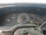 1999 Ford Econoline Cargo с VIN 1FTRE14L3XHA24386, выставлен на аукционе Copart как лот 58691045 с пробегом 129 115 миль миль и Списание • Salvage title. История ставок и продаж доступна на DreamBid. Изображение 9.