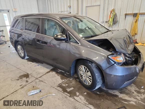 2014 Honda Odyssey LX с VIN 5FNRL5H24EB129398, выставлен на аукционе Copart как лот 85737195 с пробегом 106 336 миль миль и На запчасти • Non repairable. История ставок и продаж доступна на DreamBid. Изображение 4.