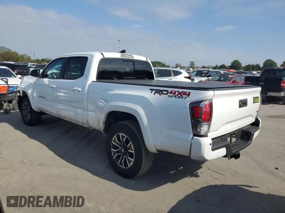 2023 Toyota Tacoma SR5 с VIN 3TMDZ5BN6PM147282, выставлен на аукционе Copart как лот 82028355 с пробегом 51 704 миль миль и Списание • Salvage title. История ставок и продаж доступна на DreamBid. Изображение 2.