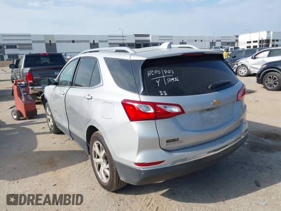 2018 Chevrolet Equinox Premier with VIN 3GNAXMEV8JL113945, listed as a IAAI auction lot 43089634 with 95,291 mi miles and . Bid and sale history available at DreamBid. Image 3.