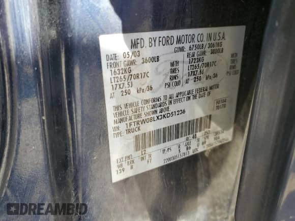 2003 Ford F-150 XLT z VIN 1FTRW08LX3KD51236, wystawiony jako Copart lot #89650665 z przebiegiem Nie podano mil oraz Szkoda całkowita • Salvage title. Historia ofert i sprzedaży dostępna na DreamBid. Obrazek 13.