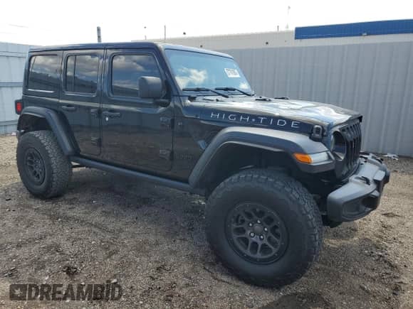 2023 Jeep Wrangler Willys with VIN 1C4HJXDG6PW663824, listed as a Copart auction lot 57761905 with 15,040 mi miles and Salvage title. Bid and sale history available at DreamBid. Image 4.