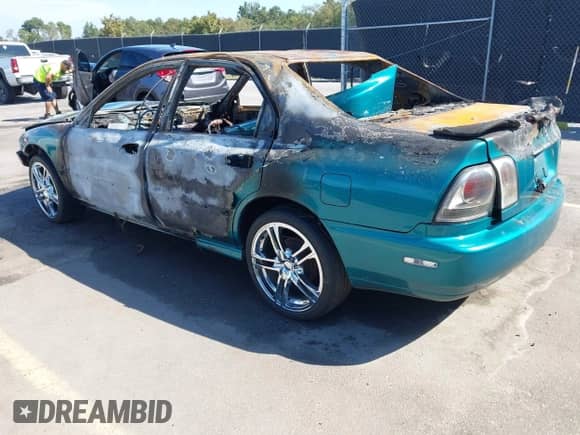 1997 Honda Accord LX with VIN 1HGCD5637VA126634, listed as a IAAI auction lot 43286087 with Not provided miles and . Bid and sale history available at DreamBid. Image 3.