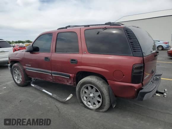2001 Chevrolet Tahoe LT with VIN 1GNEK13T51R124460, listed as a Copart auction lot 59602025 with 208,781 mi miles and Salvage title. Bid and sale history available at DreamBid. Image 2.