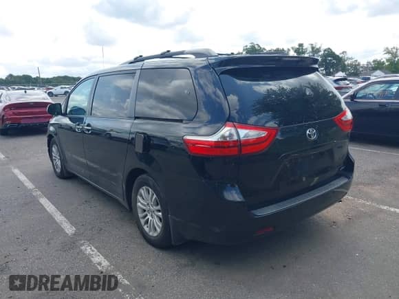 2015 Toyota Sienna XLE with VIN 5TDYK3DCXFS594038, listed as a IAAI auction lot 43181227 with 95,271 mi miles and . Bid and sale history available at DreamBid. Image 3.
