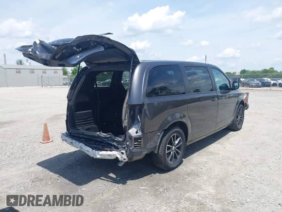 2018 Dodge Grand Caravan SE with VIN 2C4RDGBG7JR161533, listed as a IAAI auction lot 42541374 with 109,968 mi miles and . Bid and sale history available at DreamBid. Image 4.