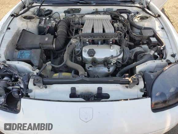 1994 Dodge Stealth with VIN JB3AM44H1RY006874, listed as a Copart auction lot 75991164 with 59,310 mi miles and Salvage title. Bid and sale history available at DreamBid. Image 11.