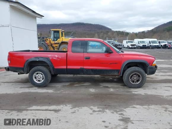 1998 Dodge Dakota SLT z VIN 1B7GG22Y1WS519712, wystawiony jako IAAI lot #41913541 z przebiegiem 232 892 mil mil oraz . Historia ofert i sprzedaży dostępna na DreamBid. Obrazek 14.