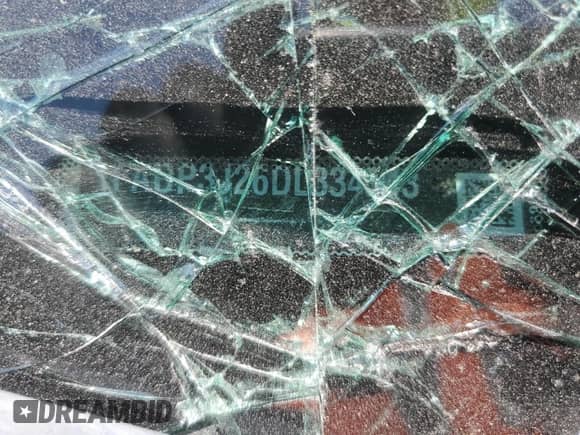 2013 Ford Focus Titanium with VIN 1FADP3J26DL334543, listed as a Copart auction lot 69324055 with Not provided miles and Salvage title. Bid and sale history available at DreamBid. Image 12.