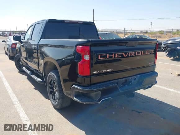 2020 Chevrolet Silverado 1500 RST with VIN 3GCUYEEDXLG216053, listed as a IAAI auction lot 42455087 with 126,504 mi miles and . Bid and sale history available at DreamBid. Image 3.
