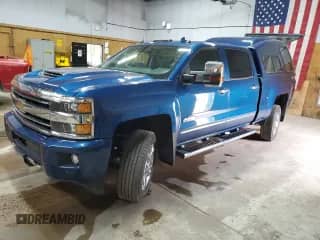 2019 Chevrolet Silverado 2500HD High Country z VIN 1GC1KUEY6KF169945, wystawiony jako Copart lot #64101075 z przebiegiem 53 077 mil mil oraz Szkoda całkowita • Salvage title. Historia ofert i sprzedaży dostępna na DreamBid. Obrazek 1.