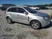 2013 Chevrolet Captiva Sport LTZ z VIN 3GNAL4EK1DS553825, wystawiony jako Copart lot #70688175 z przebiegiem Nie podano mil oraz Szkoda całkowita • Salvage title. Historia ofert i sprzedaży dostępna na DreamBid. Obrazek 4.