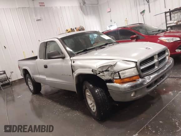 2001 Dodge Dakota с VIN 1B7GG22X21S138063, выставлен на аукционе IAAI как лот 41998737 с пробегом 210 178 миль миль и . История ставок и продаж доступна на DreamBid. Изображение 13.