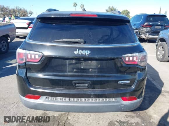 2018 Jeep Compass Latitude with VIN 3C4NJCBB4JT500329, listed as a IAAI auction lot 43486064 with 95,725 mi miles and . Bid and sale history available at DreamBid. Image 16.