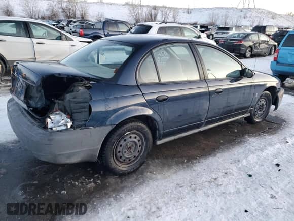 1999 Saturn SL с VIN 1G8ZF528XXZ164152, выставлен на аукционе Copart как лот 88041905 с пробегом 175 709 миль миль и Списание • Salvage title. История ставок и продаж доступна на DreamBid. Изображение 3.