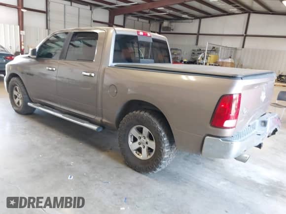 2010 Dodge 1500 SLT with VIN 1D7RB1CTXAS132594, listed as a IAAI auction lot 43039190 with 213,725 mi miles and . Bid and sale history available at DreamBid. Image 3.