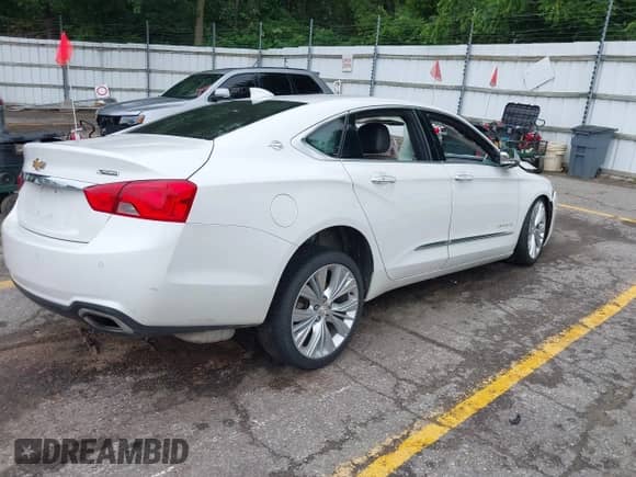 2020 Chevrolet Impala Premier with VIN 1G1105S38LU104850, listed as a IAAI auction lot 42600793 with Not provided miles and . Bid and sale history available at DreamBid. Image 4.