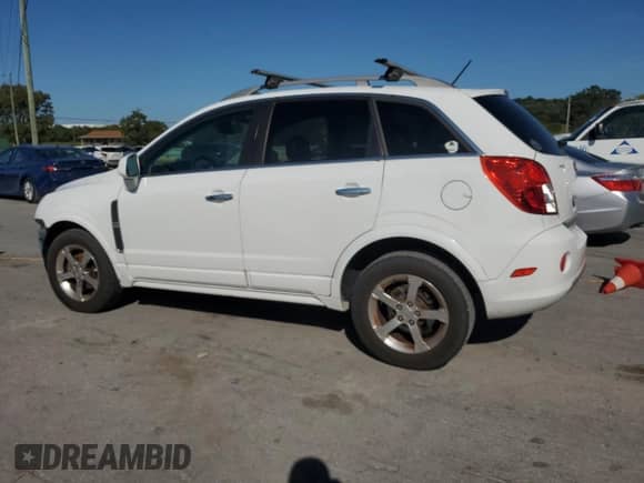 2014 Chevrolet Captiva Sport LT с VIN 3GNAL3EK9ES512306, выставлен на аукционе Copart как лот 71977725 с пробегом 142 652 миль миль и Списание • Salvage title. История ставок и продаж доступна на DreamBid. Изображение 2.