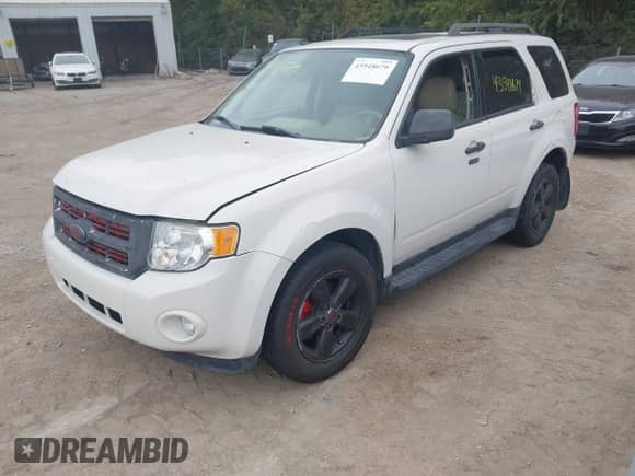 2011 Ford Escape XLT with VIN 1FMCU9D72BKC09112, listed as a IAAI auction lot 43548679 with 134,229 mi miles and . Bid and sale history available at DreamBid. Image 2.