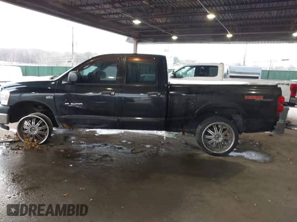 2007 Dodge 1500 SLT with VIN 1D7HU182X7S135526, listed as a IAAI auction lot 41031813 with 81,520 mi miles and . Bid and sale history available at DreamBid. Image 14.