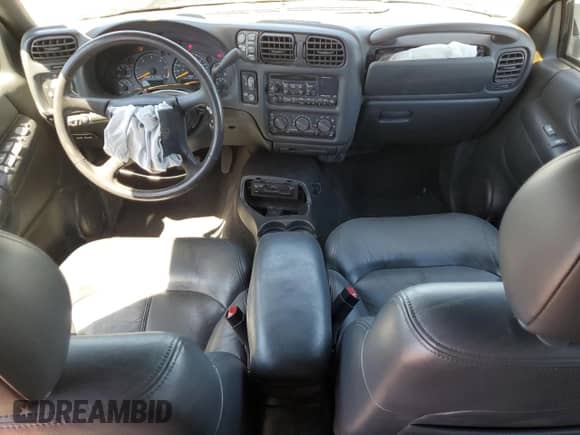 1999 Chevrolet Blazer LT z VIN 1GNDT13W4X2248675, wystawiony jako Copart lot #59103635 z przebiegiem 105 827 mil mil oraz Szkoda całkowita • Salvage title. Historia ofert i sprzedaży dostępna na DreamBid. Obrazek 8.