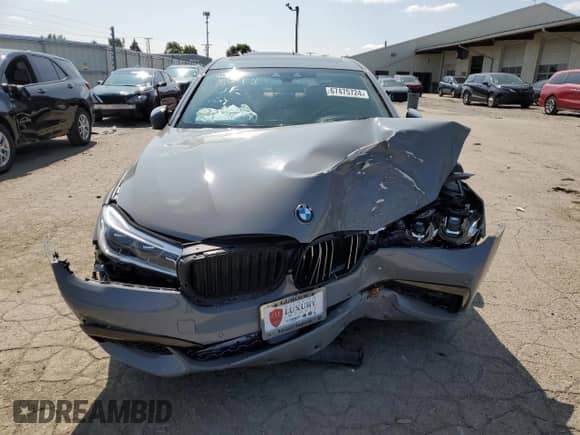 2018 BMW 7 Series 750i с VIN WBA7F0C55JGM22484, выставлен на аукционе Copart как лот 67475724 с пробегом 40 048 миль миль и Списание • Salvage title. История ставок и продаж доступна на DreamBid. Изображение 5.