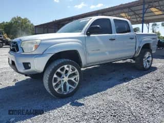2012 Toyota Tacoma PreRunner with VIN 3TMJU4GNXCM129656, listed as a Copart auction lot 80299695 with 187,844 mi miles and Salvage title. Bid and sale history available at DreamBid. Image 1.