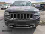 2016 Jeep Grand Cherokee Overland z VIN 1C4RJFCG6GC490047, wystawiony jako Copart lot #54076295 z przebiegiem 57 084 mil mil oraz Szkoda całkowita • Salvage title. Historia ofert i sprzedaży dostępna na DreamBid. Obrazek 5.