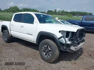 2023 Toyota Tacoma SR z VIN 3TMCZ5AN3PM591412, wystawiony jako IAAI lot #42698181 z przebiegiem 37 297 mil mil oraz . Historia ofert i sprzedaży dostępna na DreamBid. Obrazek 1.