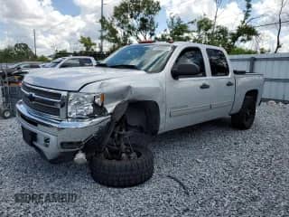 2013 Chevrolet Silverado 1500 LT with VIN 3GCPKSE77DG285453, listed as a Copart auction lot 69594835 with 104,839 mi miles and Salvage title. Bid and sale history available at DreamBid. Image 1.