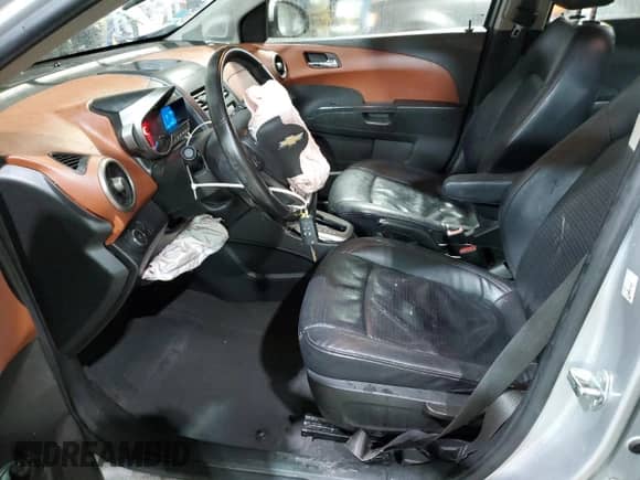 2013 Chevrolet Sonic LTZ with VIN 1G1JE5SH6D4102528, listed as a Copart auction lot 47419475 with 129,812 mi miles and Salvage title. Bid and sale history available at DreamBid. Image 7.